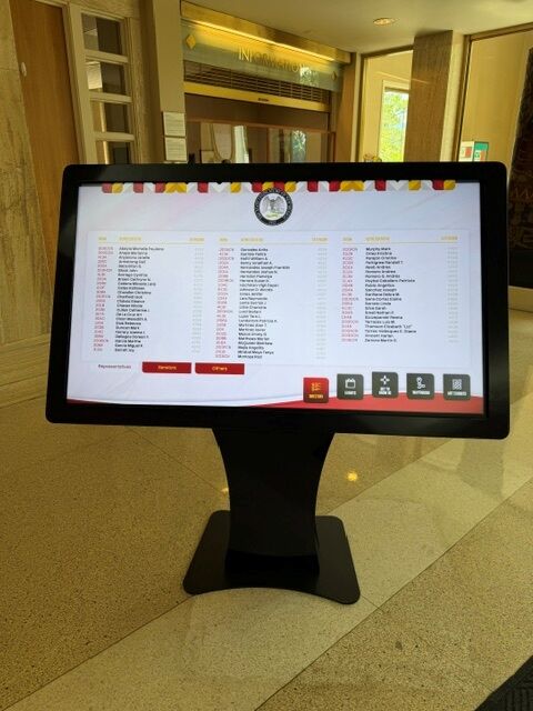 Searchable directory screen on NoviSign kiosk listing representatives and senators by room and extension