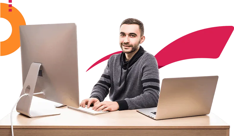 Screenverse 0000 confident young entrepreneur sitting table with laptop pc looking camera isolated white