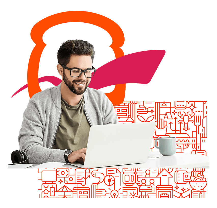 Person setting up digital menu boards on a laptop in a restaurant